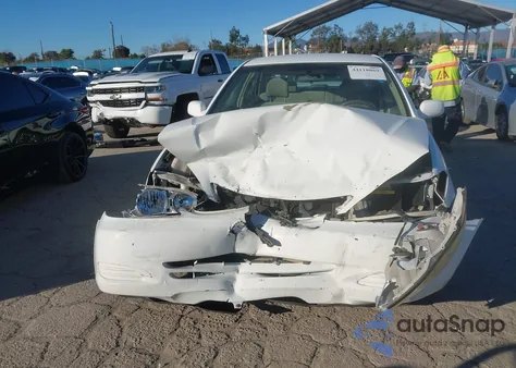 2003 Toyota Camry Le z USA, uszkodzony, nr VIN 4T1BE32K23U123687